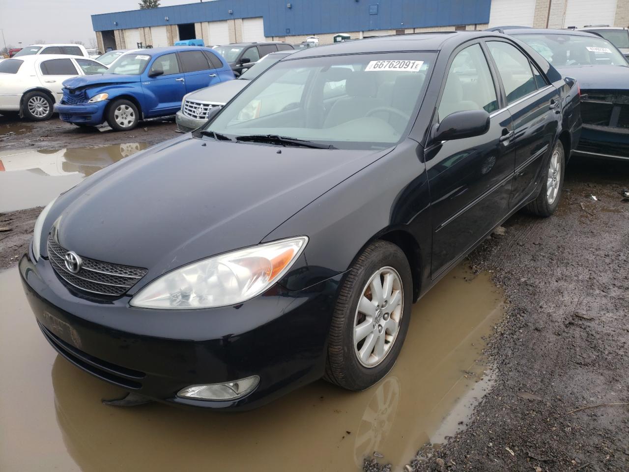 Photo 2 from auction – 2004 TOYOTA CAMRY LE with VIN 4T1BE32KX4U320642