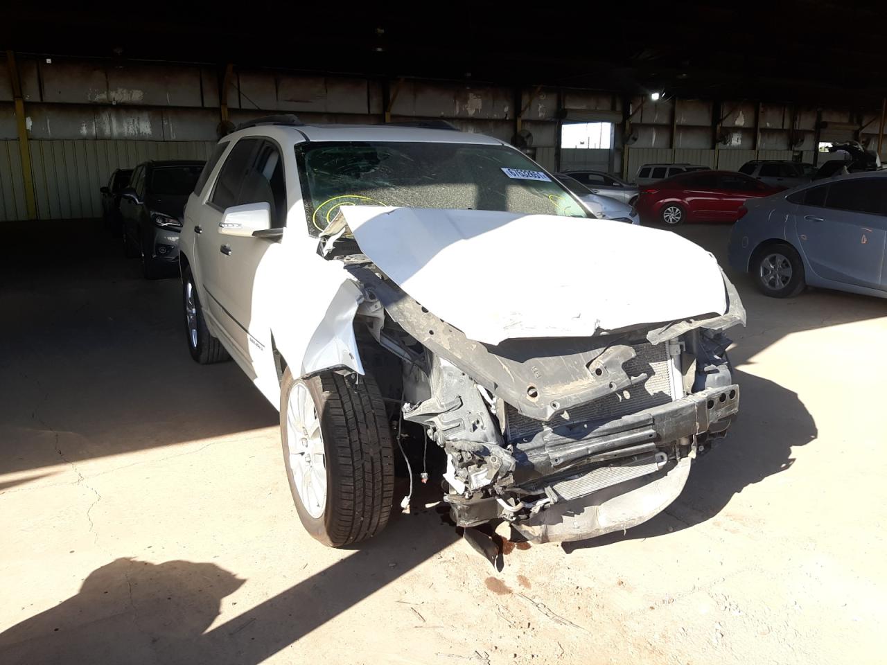 GMC ACADIA DEN 2015 with VIN 1GKKRTKD7FJ254649 - Photo from auction