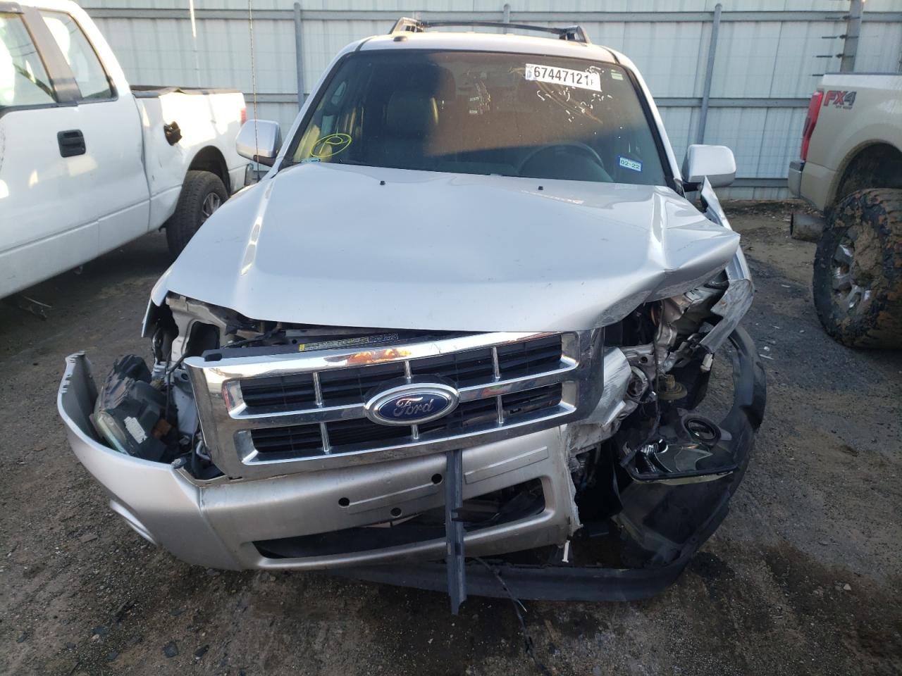 Photo 7 from auction – 2010 FORD ESCAPE LIM with VIN 1FMCU0EG7AKA12879