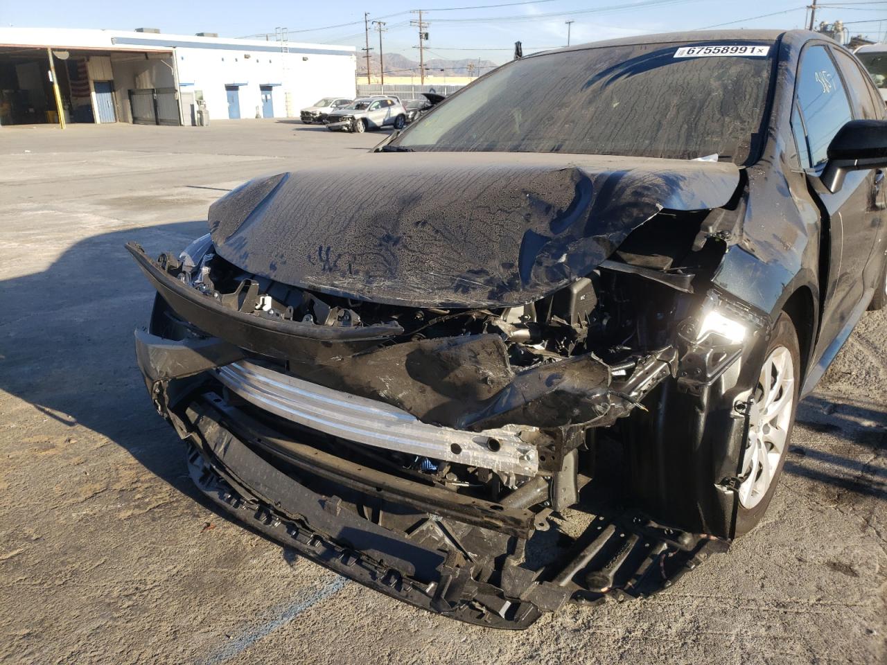 Photo 9 from auction – 2021 TOYOTA COROLLA LE with VIN JTDEPMAE0MJ168532