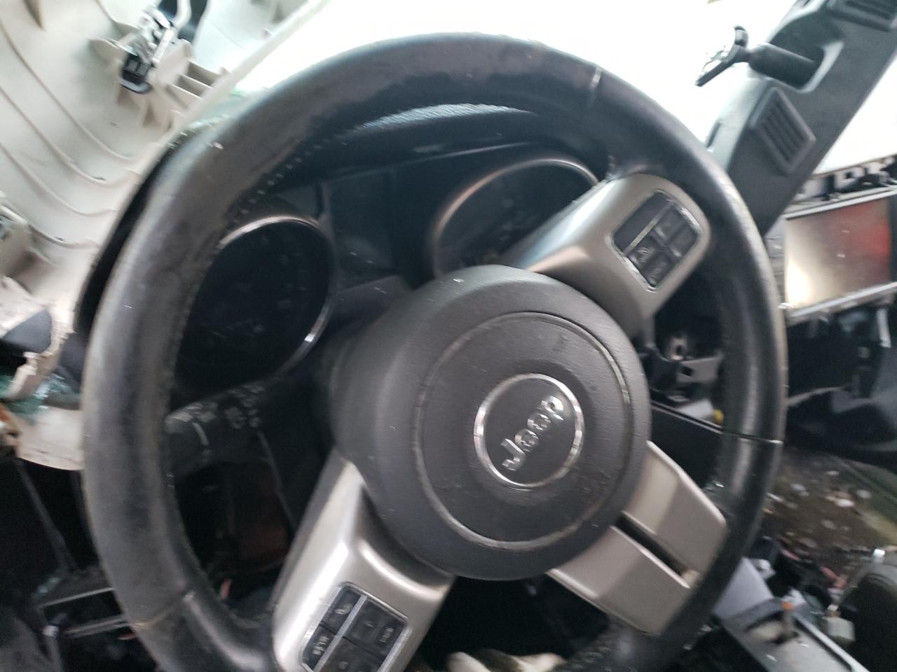 Photo 8 from auction – 2012 JEEP GRAND CHER with VIN 1C4RJFAG7CC220077