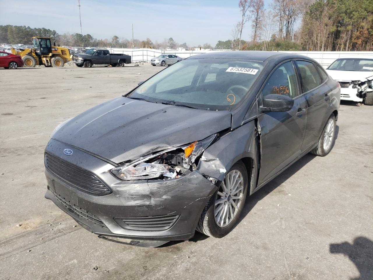 Photo 2 from auction – 2016 FORD FOCUS S with VIN 1FADP3E23GL355705