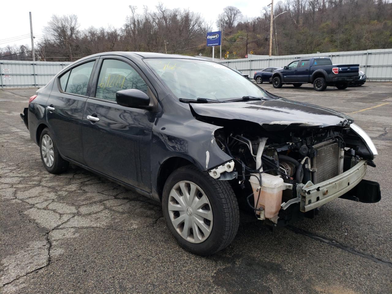 NISSAN VERSA S 2015 with VIN 3N1CN7APXFL891304 - Photo from auction
