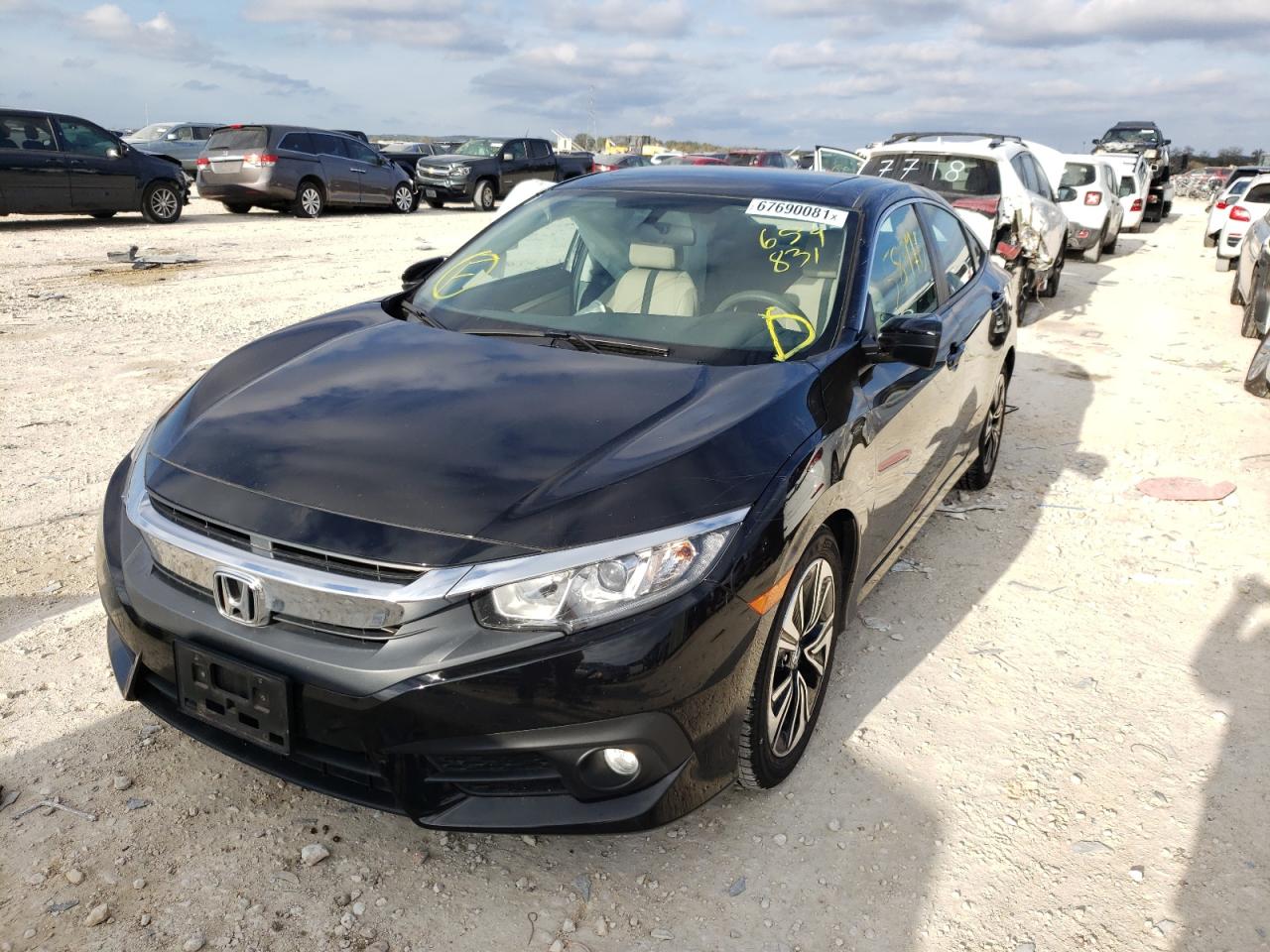 Photo 2 from auction – 2017 HONDA CIVIC EX with VIN 2HGFC1F32HH659831