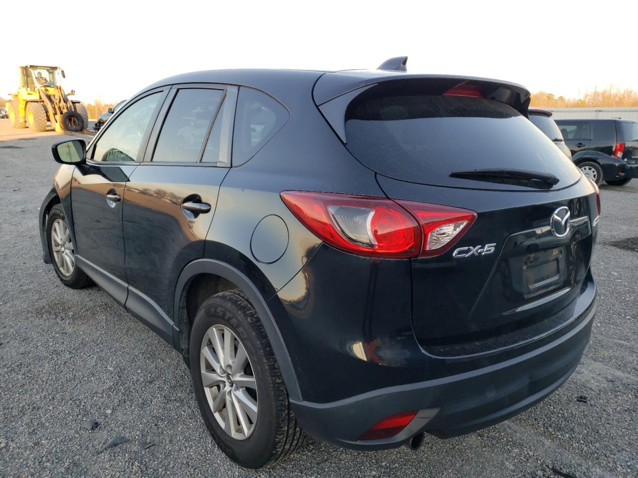 Photo 3 from auction – 2015 MAZDA CX-5 with VIN JM3KE2CY5F0541388