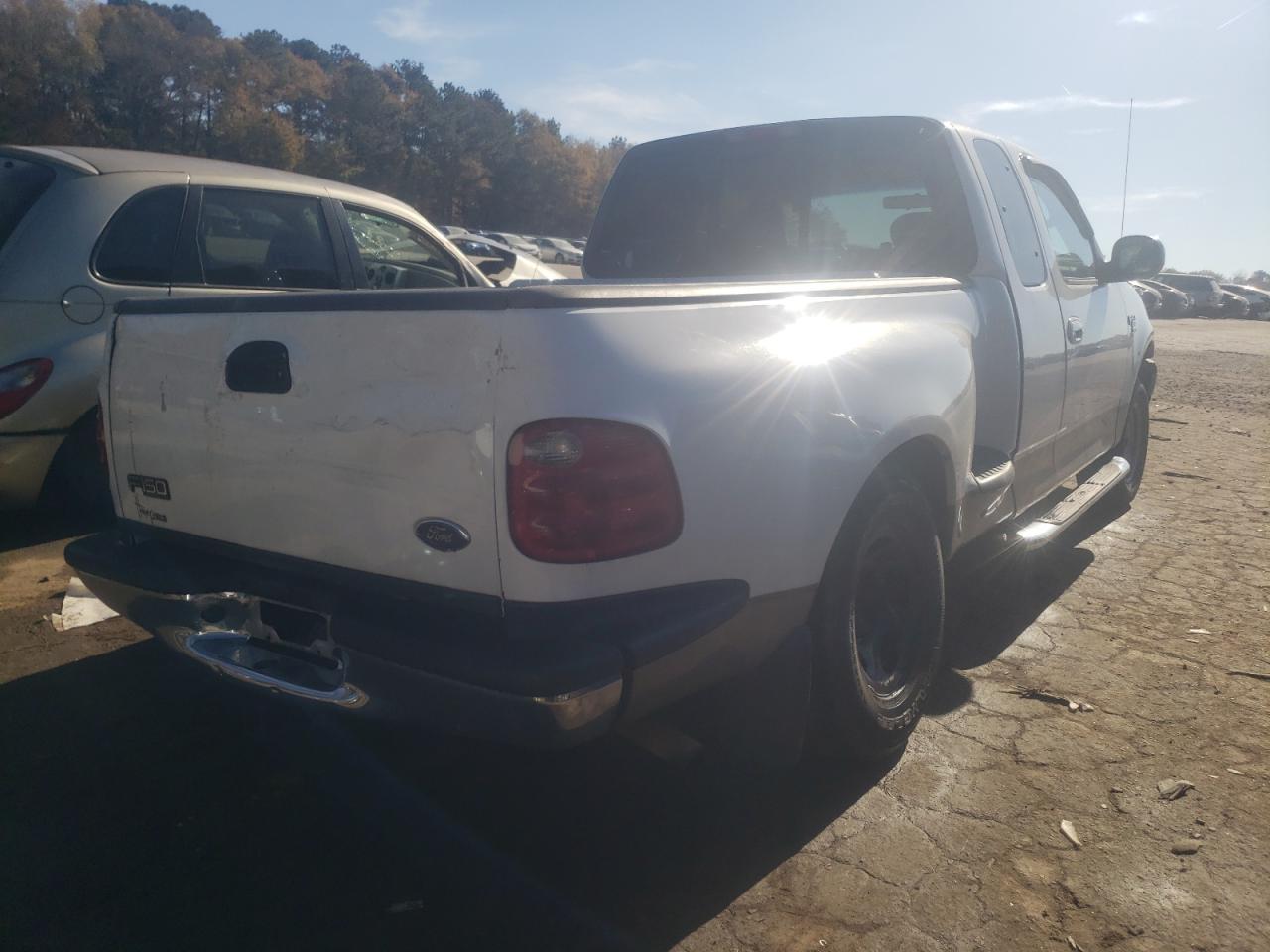 Photo 4 from auction – 2002 FORD F150 with VIN 2FTRX07W32CA85635