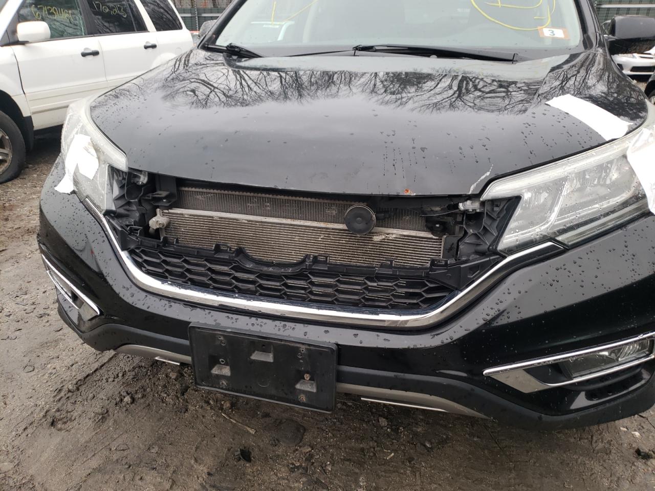 Photo 9 from auction – 2015 HONDA CR-V EX with VIN 5J6RM4H58FL070656