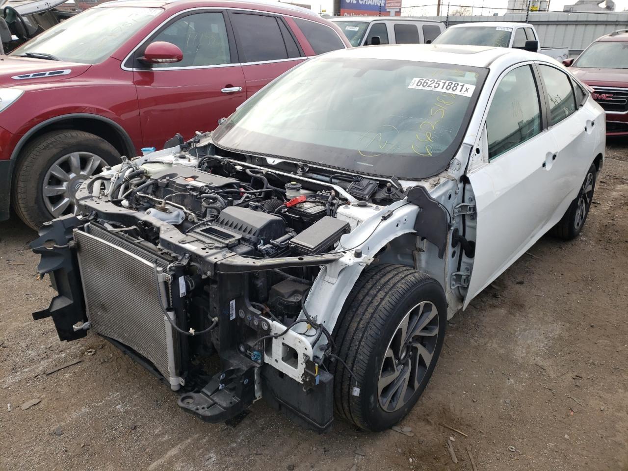 Photo 2 from auction – 2018 HONDA CIVIC EX with VIN 19XFC2F73JE002805