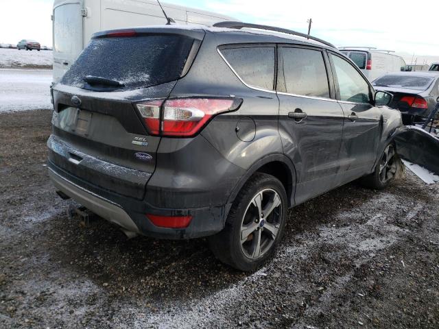 Photo 4 from auction – 2018 FORD ESCAPE SEL with VIN 1FMCU9H94JUC23401