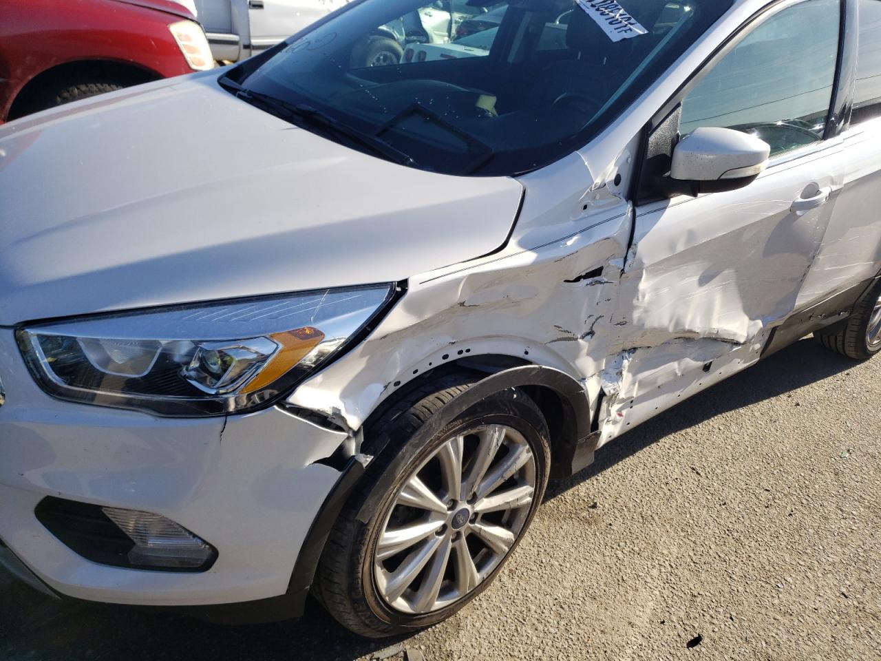 Photo 9 from auction – 2017 FORD ESCAPE TIT with VIN 1FMCU0JD7HUE34287