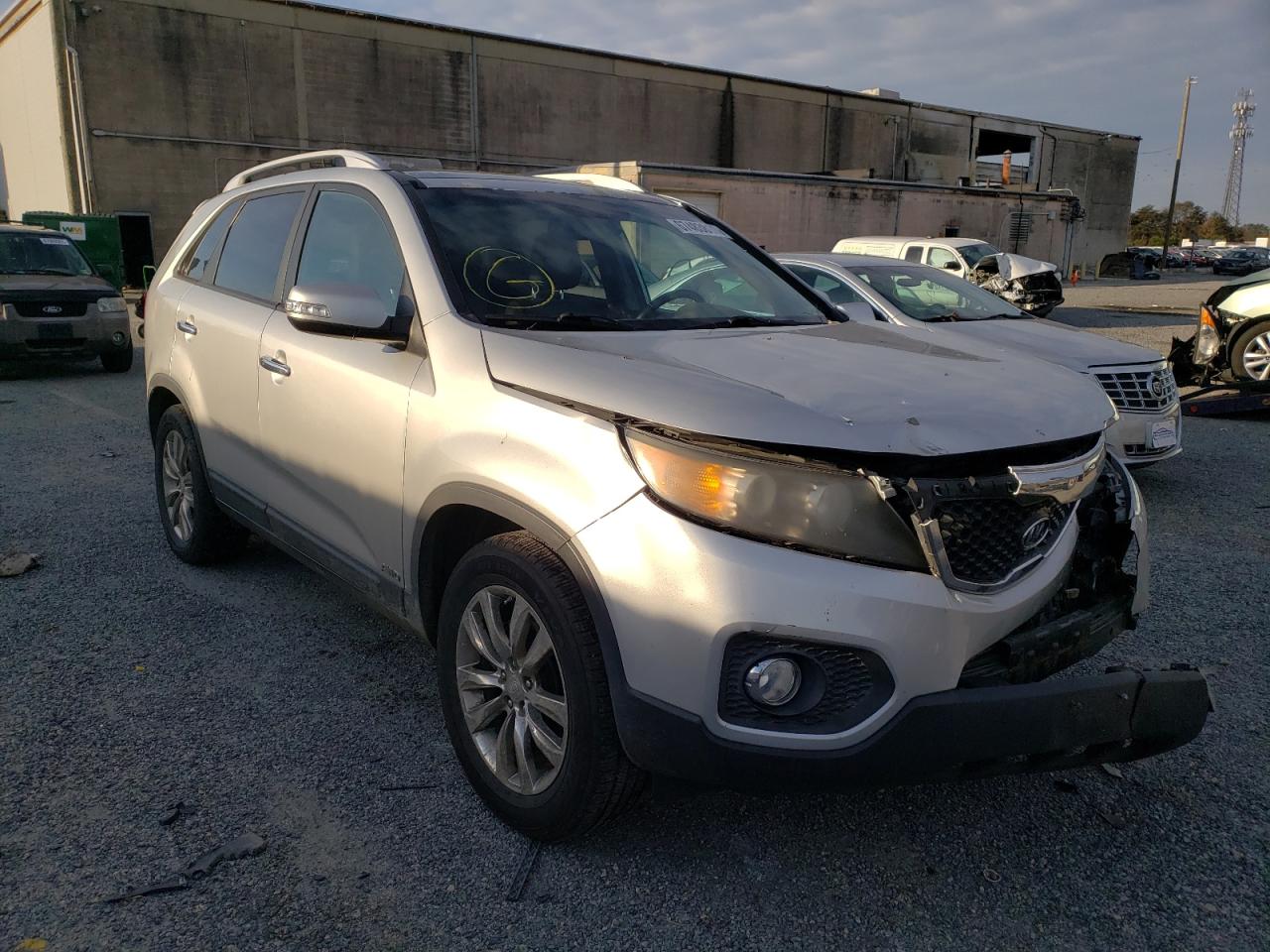 KIA SORENTO EX 2011 with VIN 5XYKUDA20BG057865 - Photo from auction
