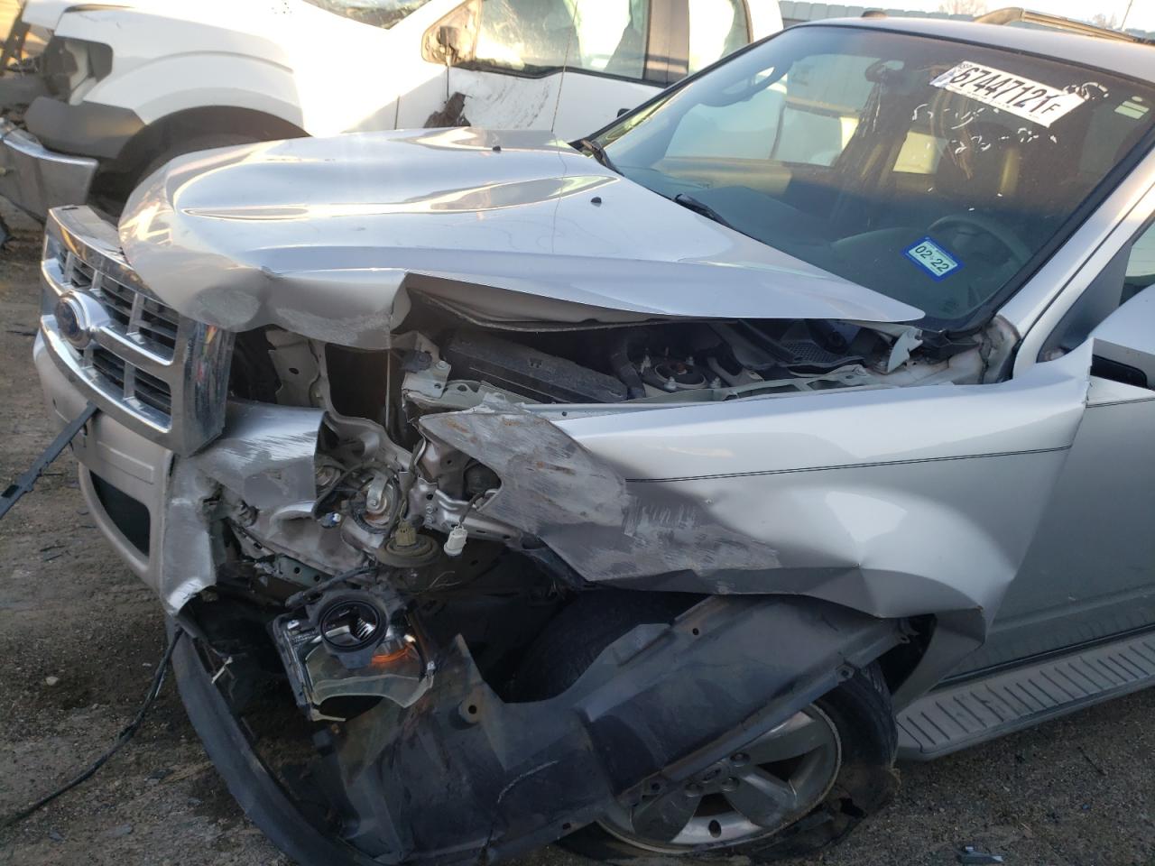 Photo 9 from auction – 2010 FORD ESCAPE LIM with VIN 1FMCU0EG7AKA12879