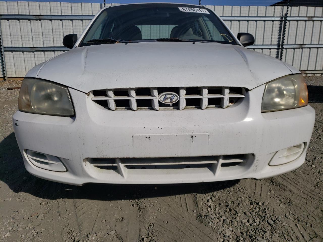 Photo 7 from auction – 2002 HYUNDAI ACCENT GL with VIN KMHCG45C22U311908