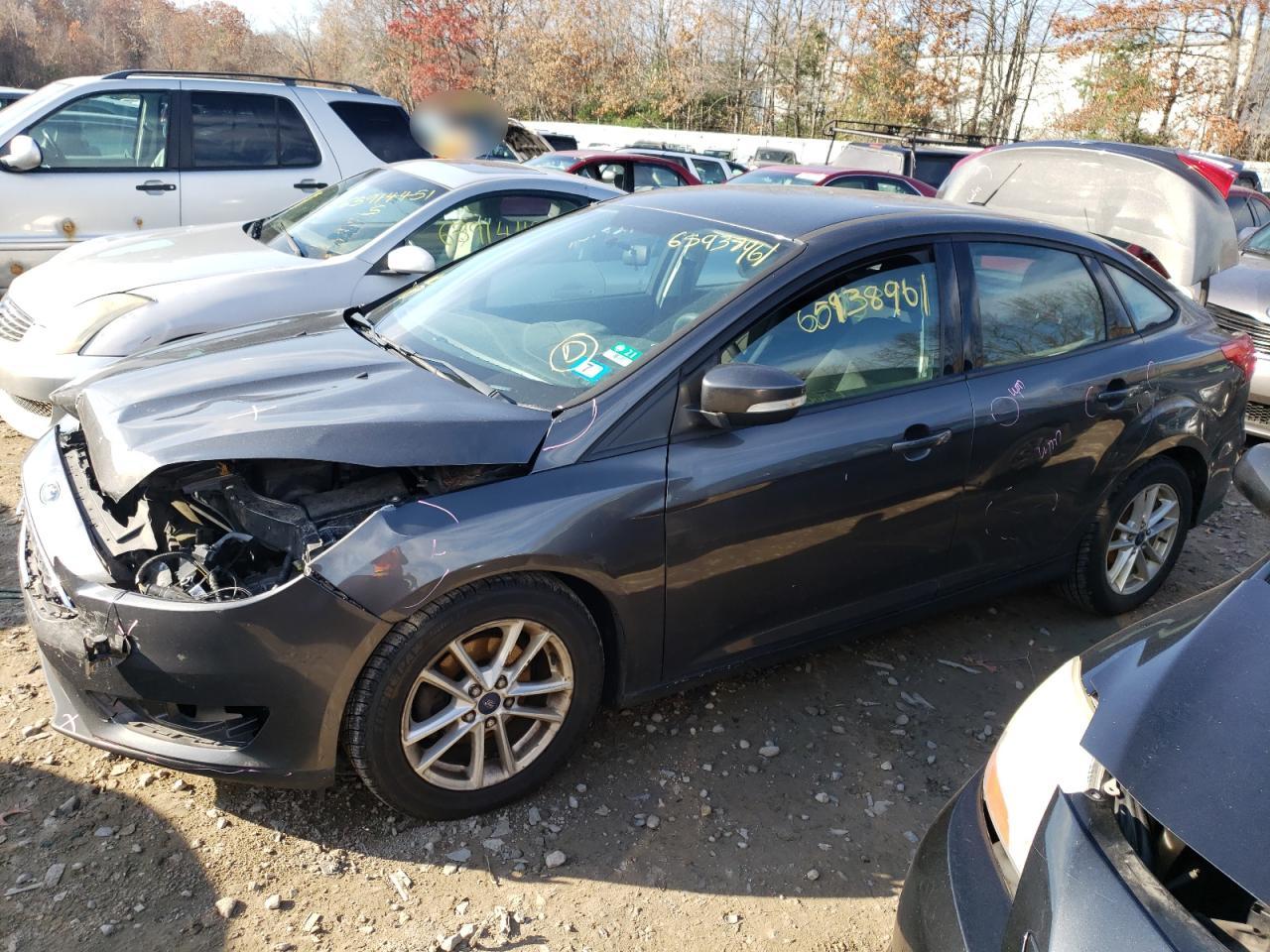 Photo 2 from auction – 2015 FORD FOCUS SE with VIN 1FADP3F21FL364920