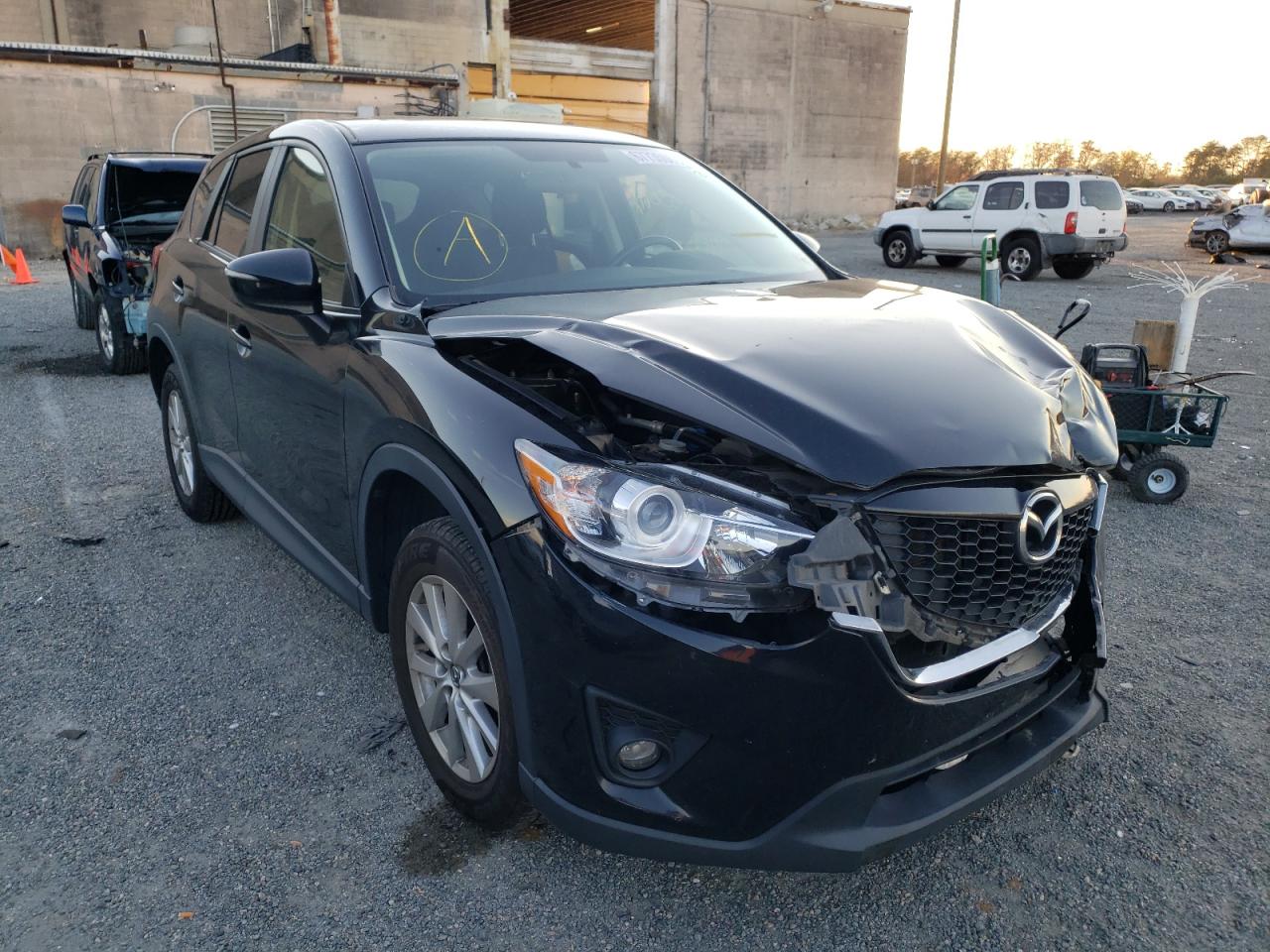 MAZDA CX-5 2015 with VIN JM3KE2CY5F0541388 - Photo from auction