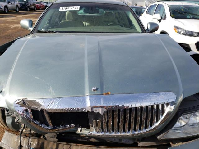 Photo 7 from auction – 2004 LINCOLN TOWN CAR E with VIN 1LNHM81W24Y663100