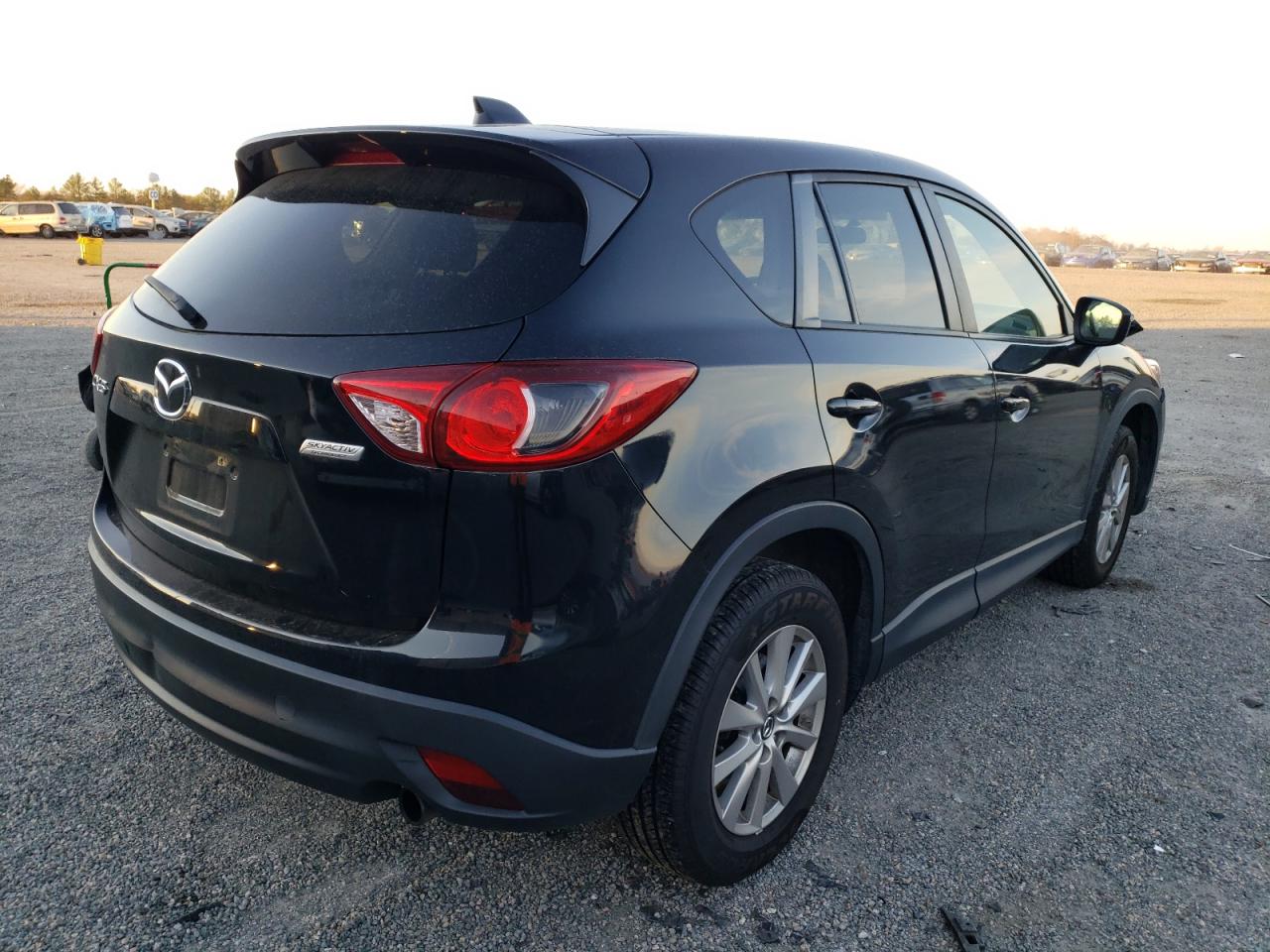 Photo 4 from auction – 2015 MAZDA CX-5 with VIN JM3KE2CY5F0541388