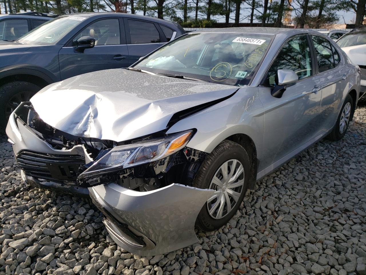 Photo 2 from auction – 2022 TOYOTA CAMRY LE with VIN 4T1C31AK4NU573098