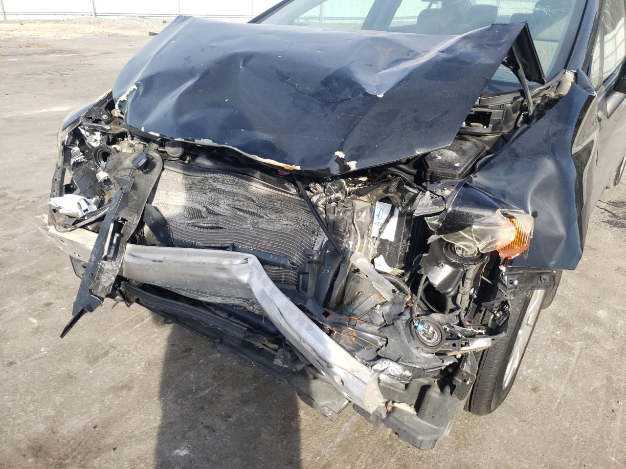 Photo 9 from auction – 2012 HONDA CIVIC LX with VIN 2HGFB2F59CH581096