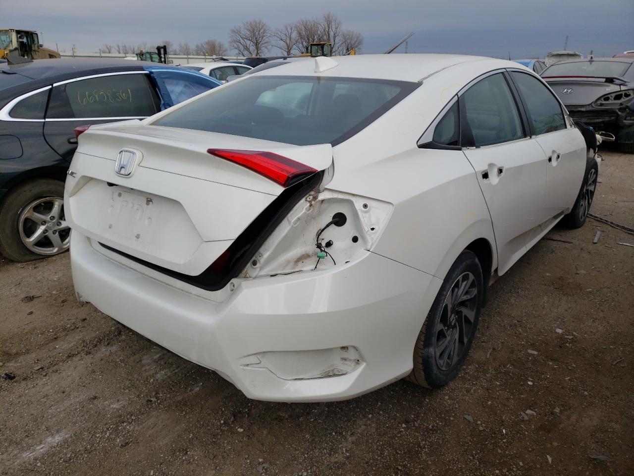 Photo 4 from auction – 2018 HONDA CIVIC EX with VIN 19XFC2F73JE002805