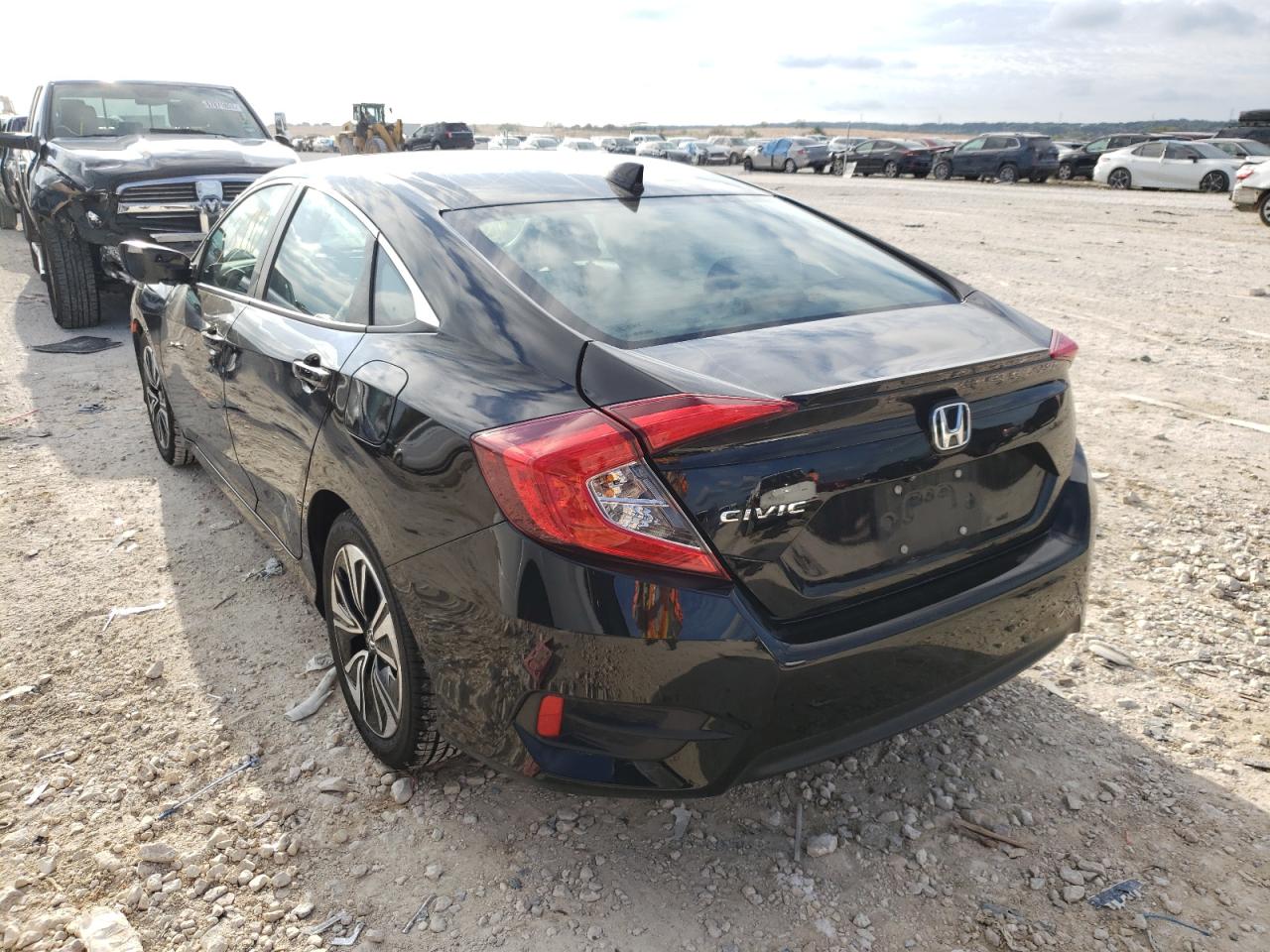 Photo 3 from auction – 2017 HONDA CIVIC EX with VIN 2HGFC1F32HH659831