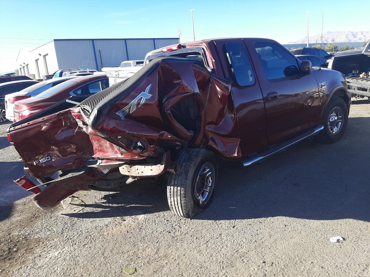 Photo 4 from auction – 2003 FORD F150 with VIN 2FTRX17W43CA54904