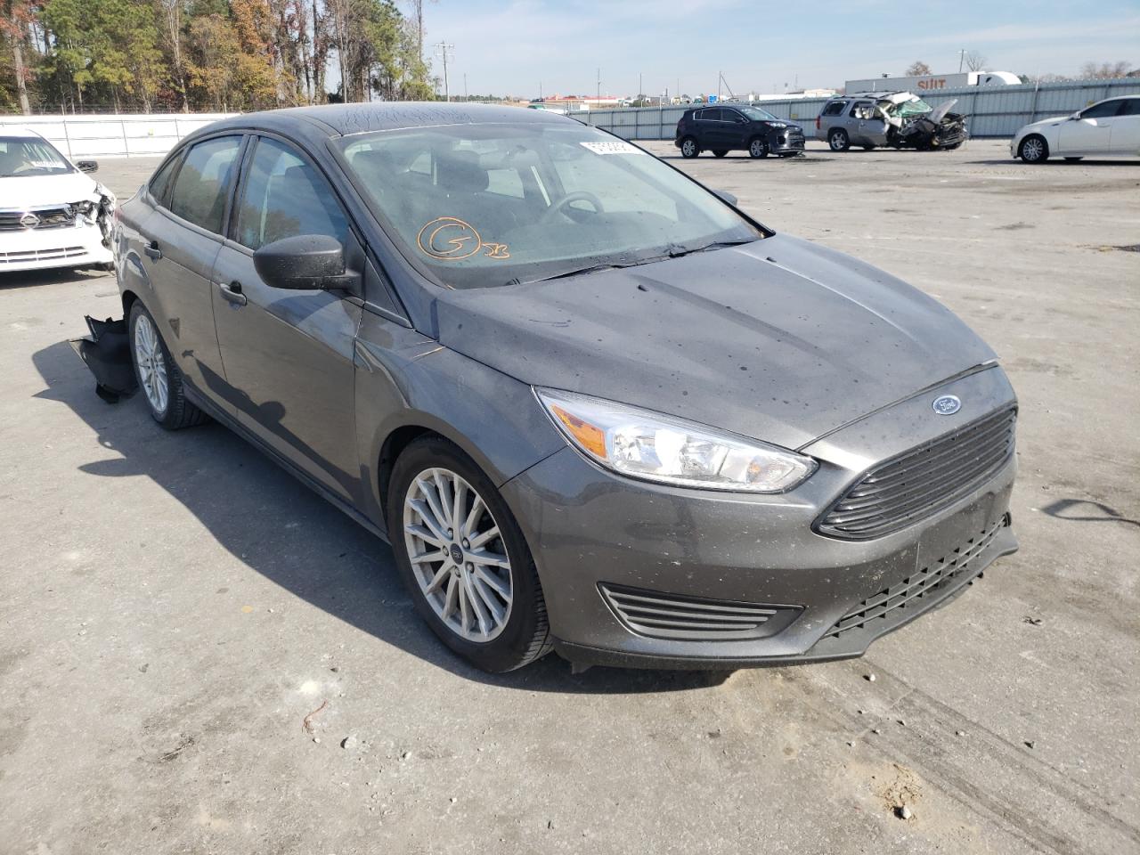 FORD FOCUS S 2016 with VIN 1FADP3E23GL355705 - Photo from auction