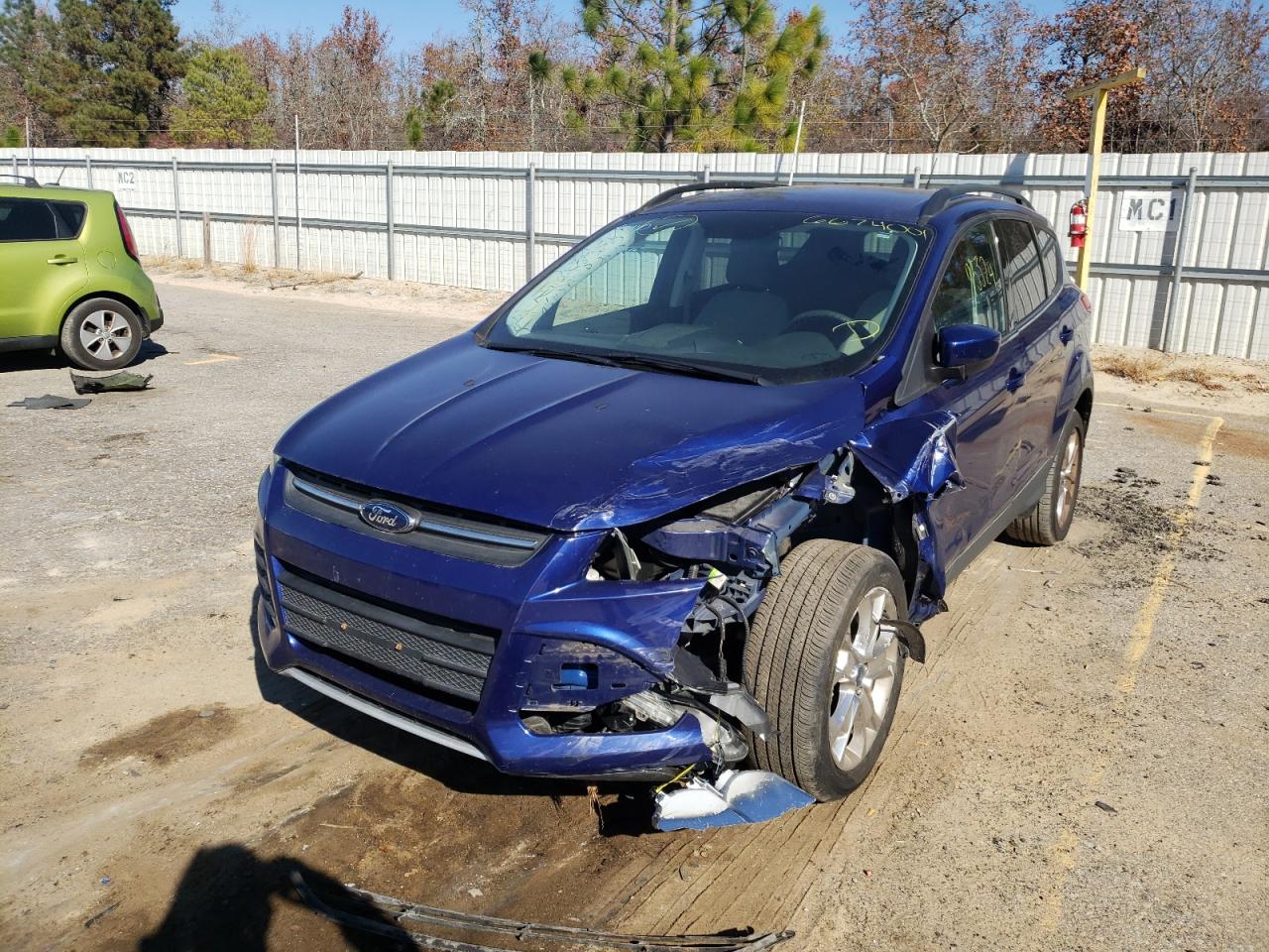 Photo 2 from auction – 2014 FORD ESCAPE SE with VIN 1FMCU0G96EUB76035