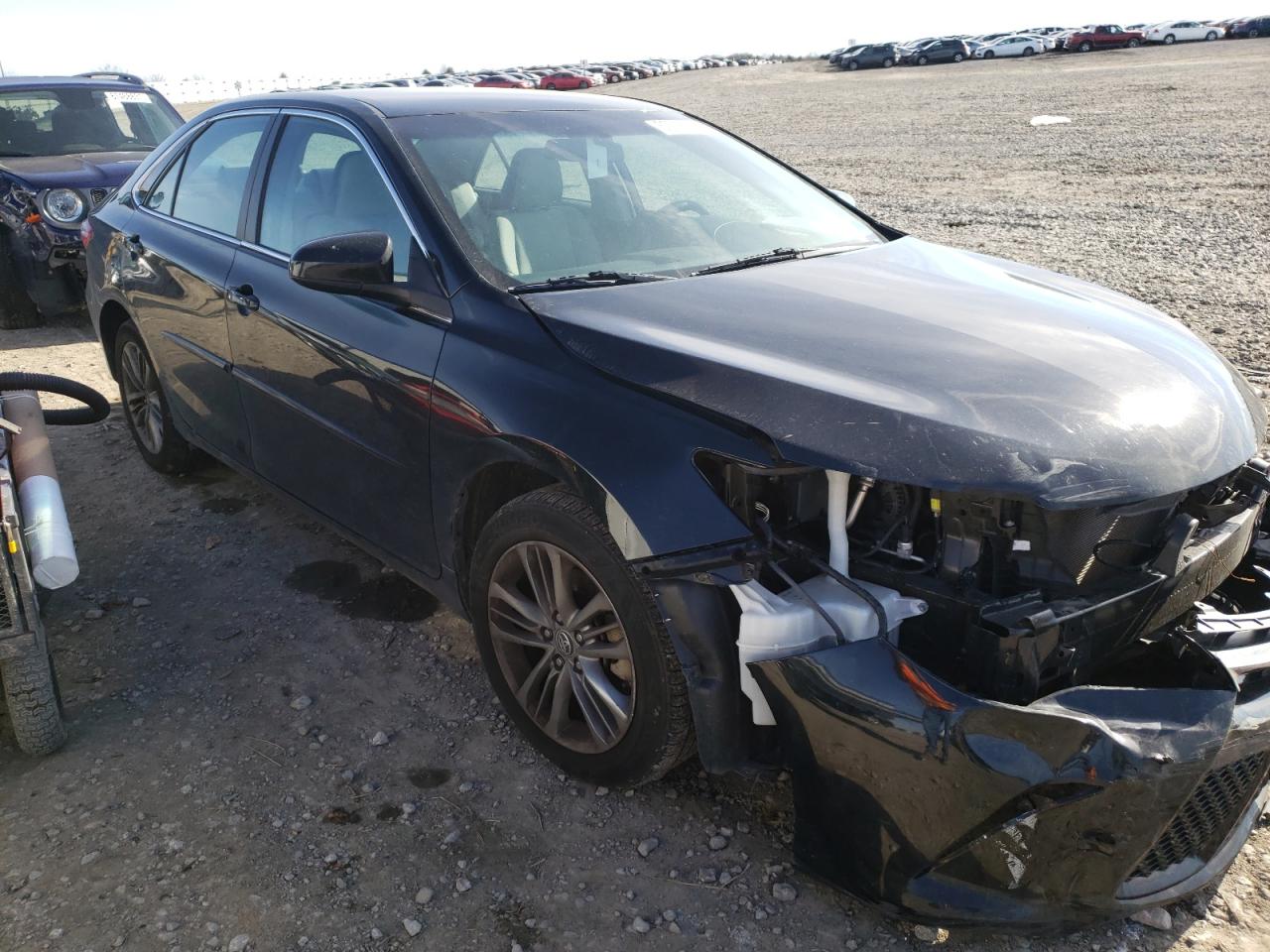 TOYOTA CAMRY LE 2016 with VIN 4T1BF1FKXGU163940 - Photo from auction