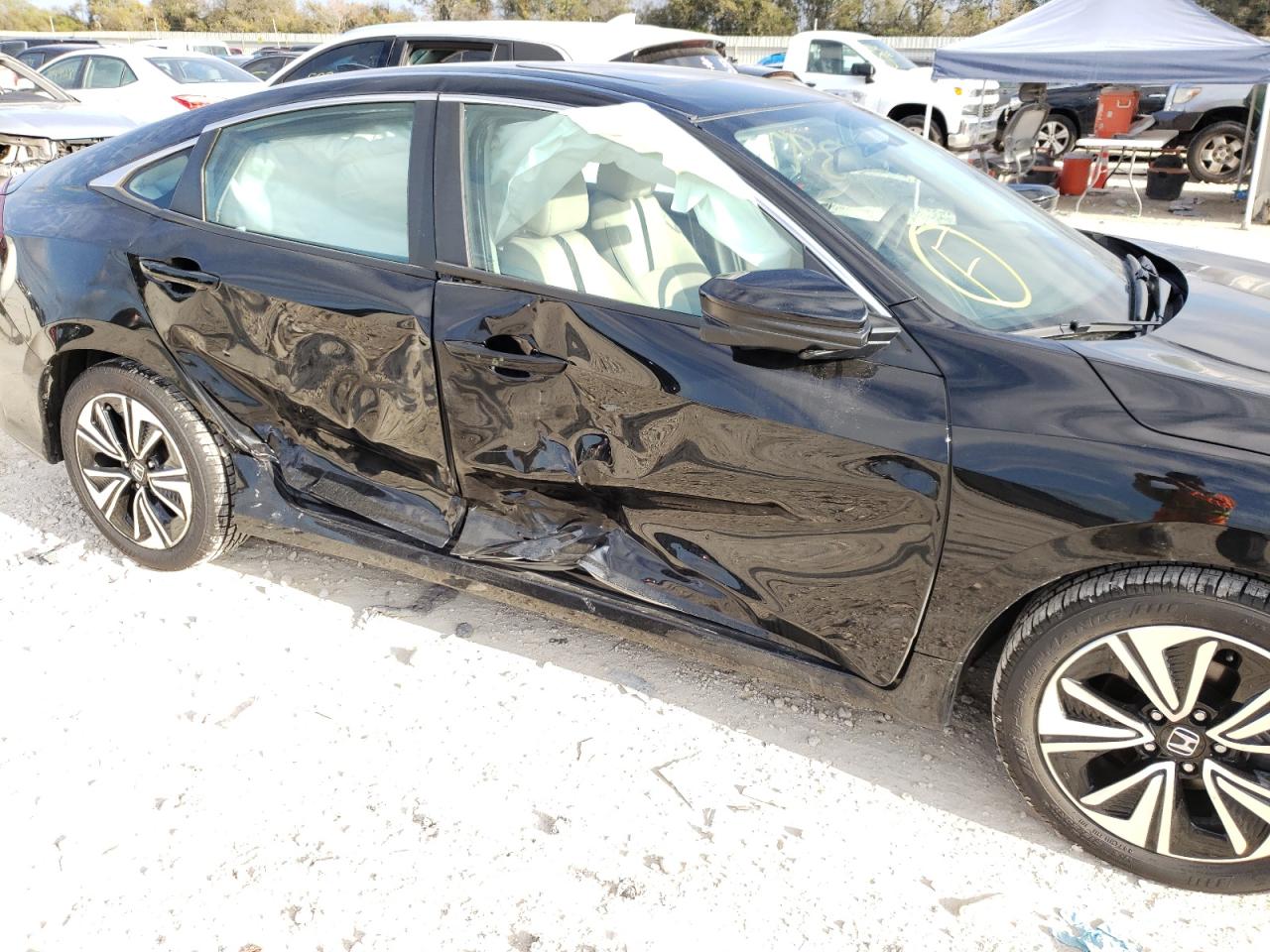Photo 9 from auction – 2017 HONDA CIVIC EX with VIN 2HGFC1F32HH659831