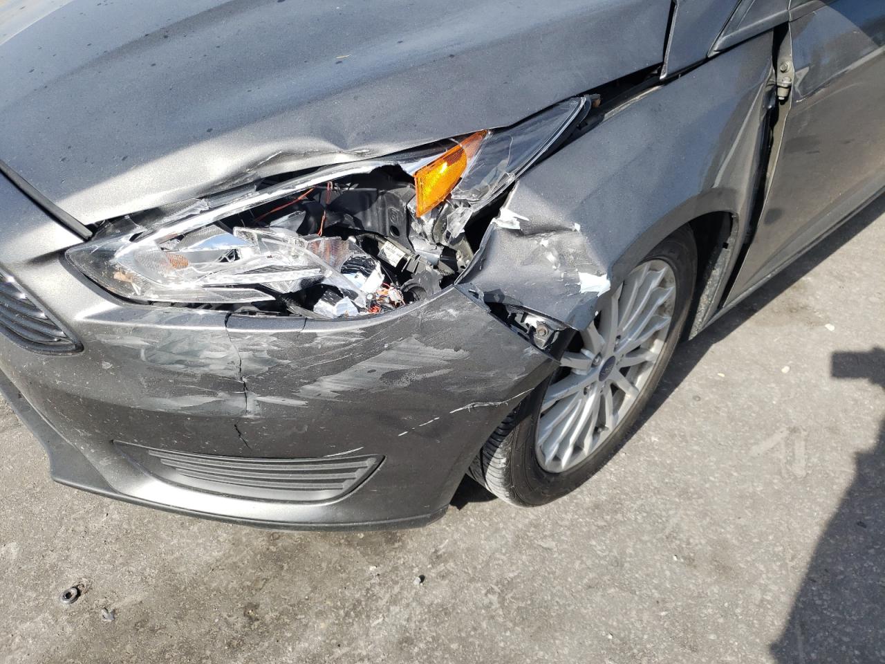 Photo 9 from auction – 2016 FORD FOCUS S with VIN 1FADP3E23GL355705