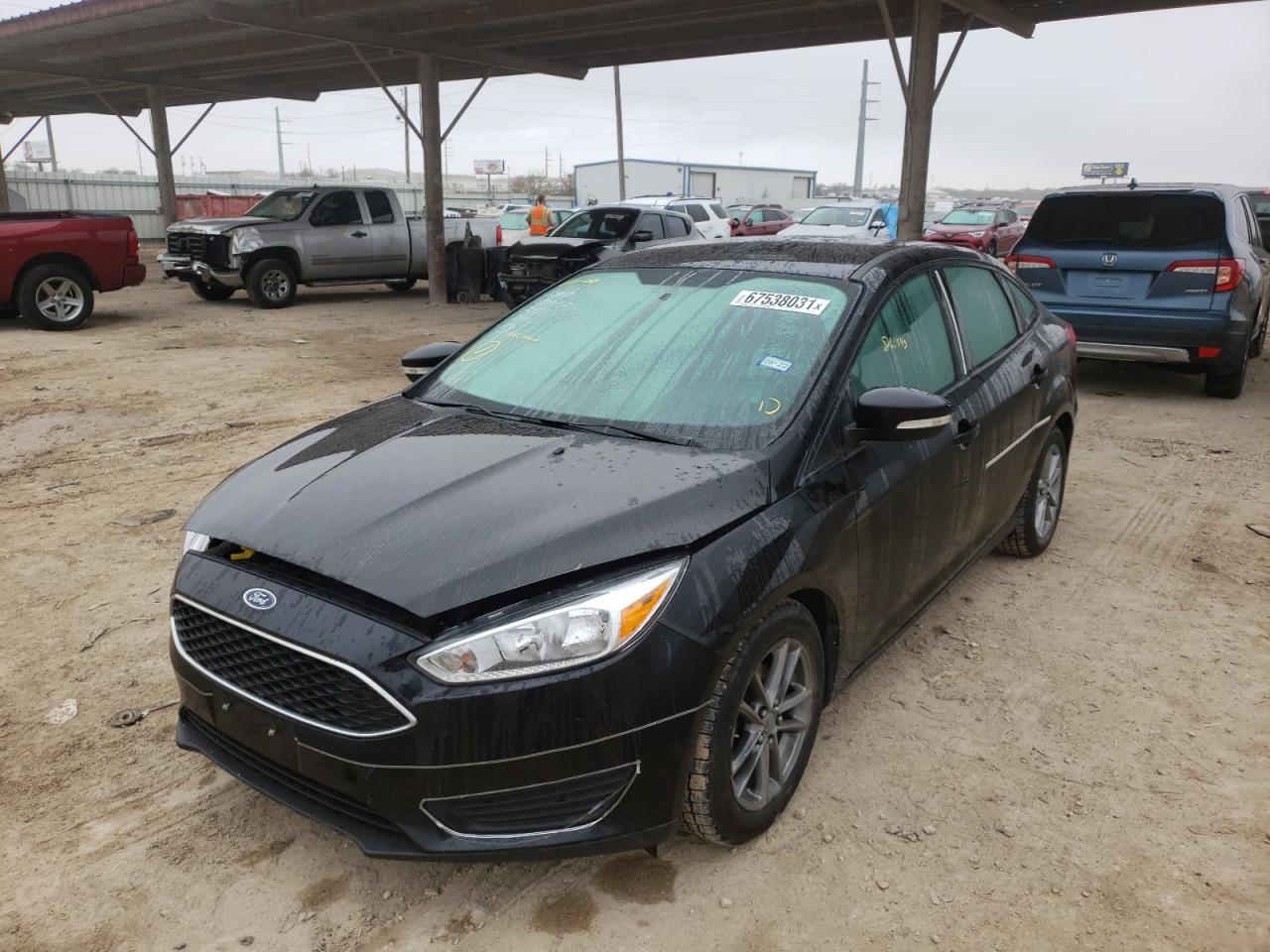 Photo 2 from auction – 2016 FORD FOCUS SE with VIN 1FADP3F20GL217246