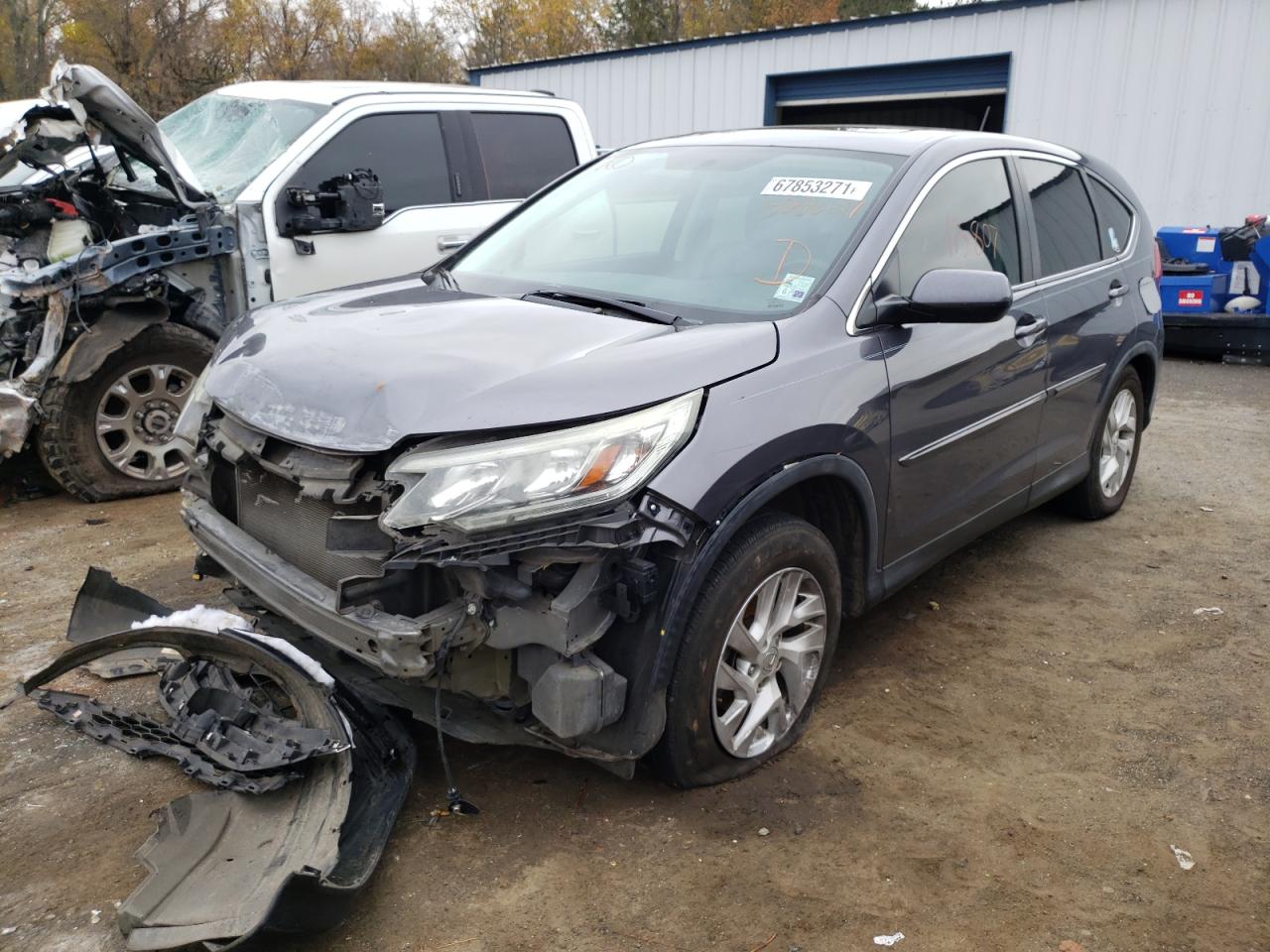 Photo 2 from auction – 2015 HONDA CR-V EX with VIN 2HKRM3H57FH508667