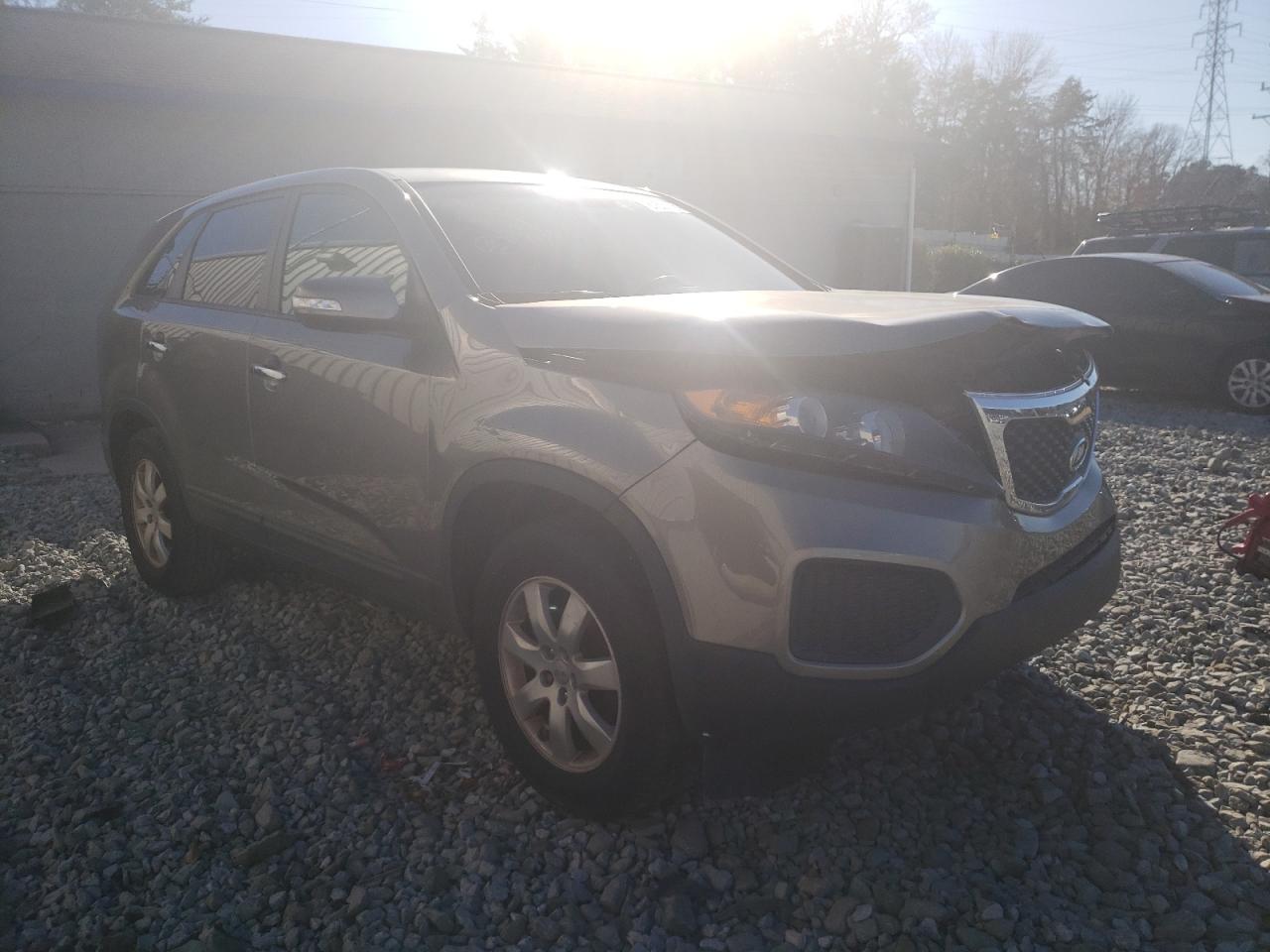 KIA SORENTO LX 2013 with VIN 5XYKT4A11DG359470 - Photo from auction