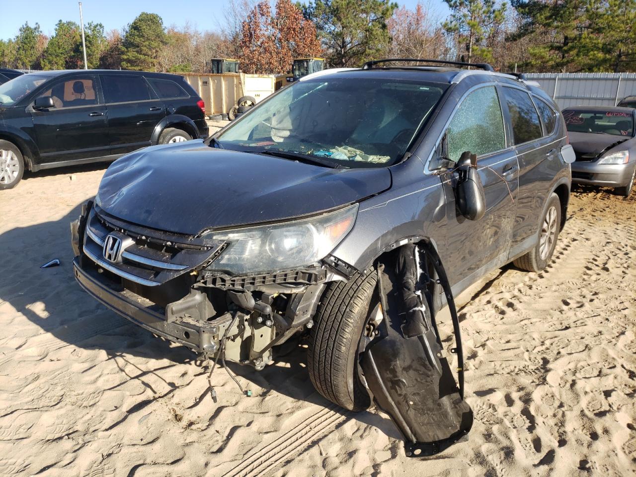 Photo 2 from auction – 2013 HONDA CR-V EX with VIN 2HKRM3H53DH509280