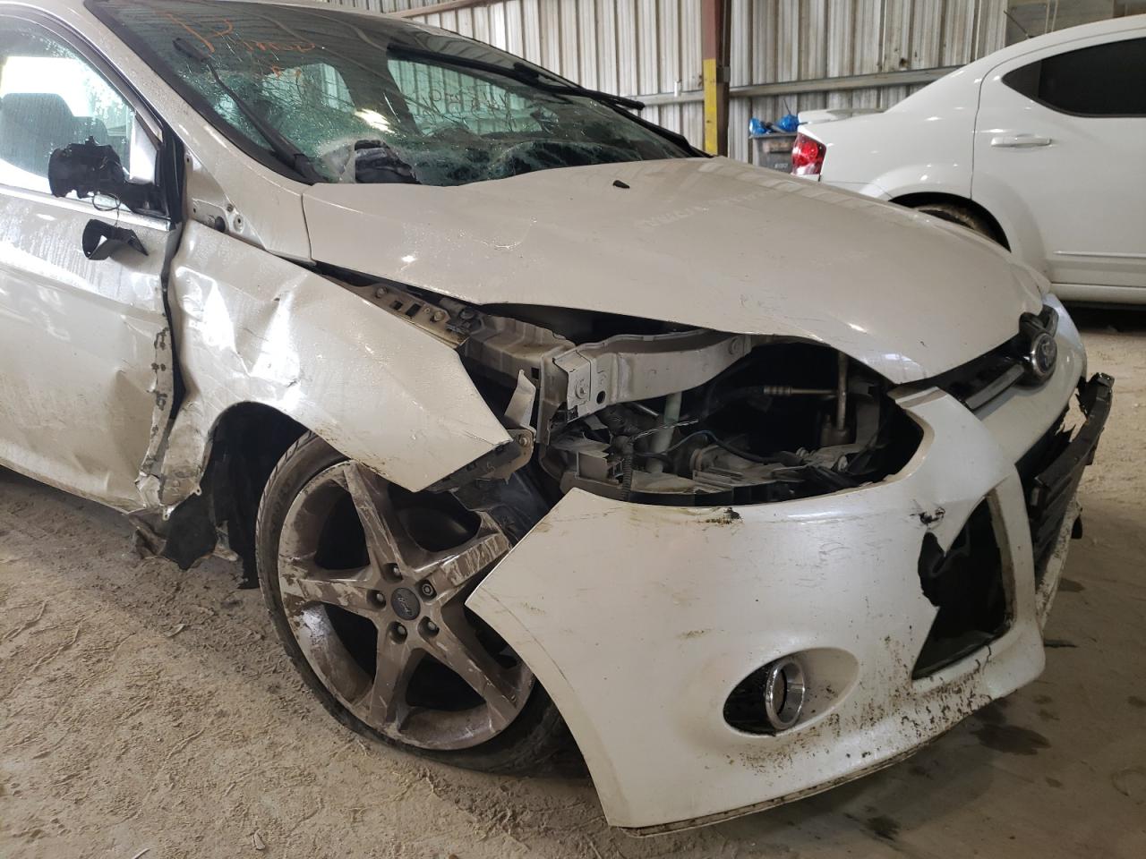 Photo 9 from auction – 2012 FORD FOCUS TITA with VIN 1FAHP3J25CL377397