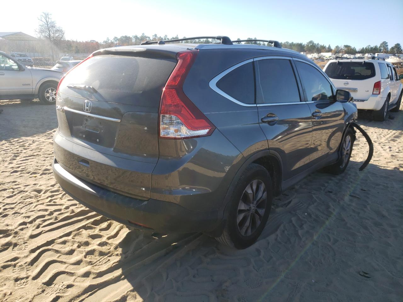 Photo 4 from auction – 2013 HONDA CR-V EX with VIN 2HKRM3H53DH509280