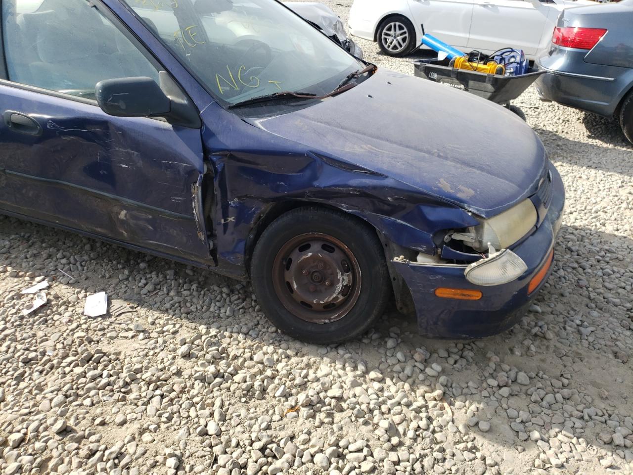 Photo 9 from auction – 1996 MAZDA PROTEGE DX with VIN JM1BB1413T0320428