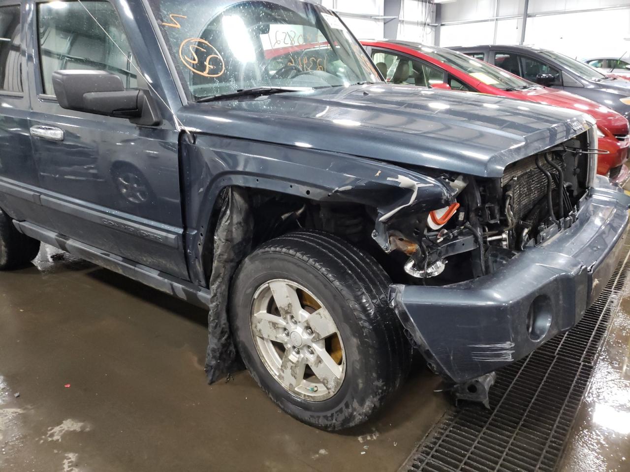 Photo 10 from auction – 2007 JEEP COMMANDER with VIN 1J8HG48P17C591867