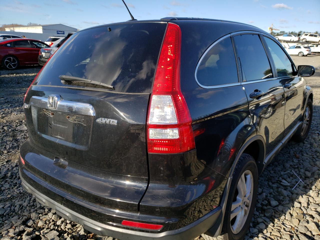 Photo 4 from auction – 2011 HONDA CR-V EXL with VIN 5J6RE4H70BL076380
