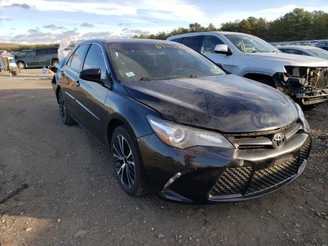 TOYOTA CAMRY LE 2017 with VIN 4T1BF1FK4HU716678 - Photo from auction
