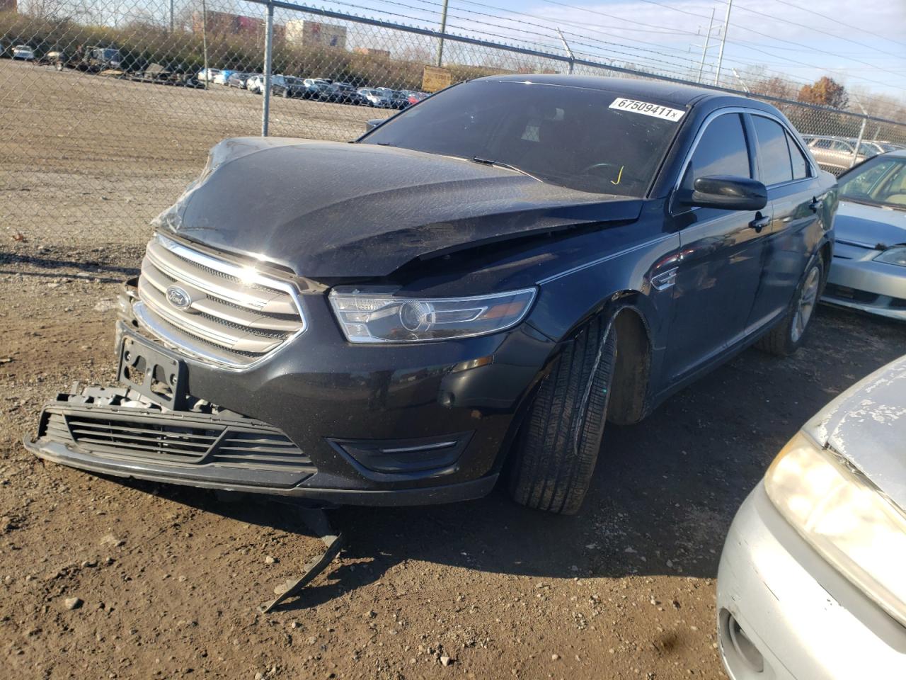 Photo 2 from auction – 2017 FORD TAURUS SEL with VIN 1FAHP2H8XHG118389