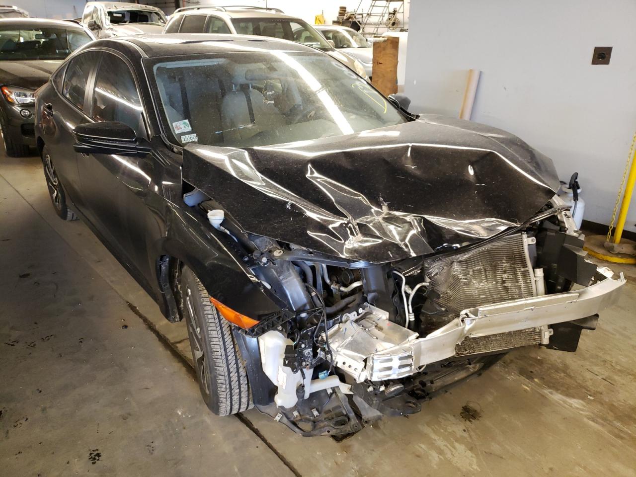 HONDA CIVIC 2017 with VIN 19XFC2F72HE033635 - Photo from auction