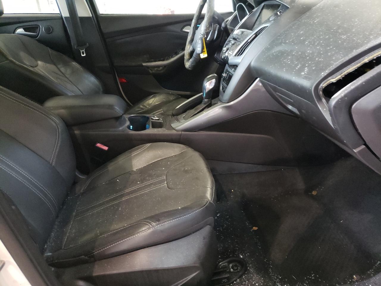 Photo 5 from auction – 2012 FORD FOCUS TITA with VIN 1FAHP3J25CL377397