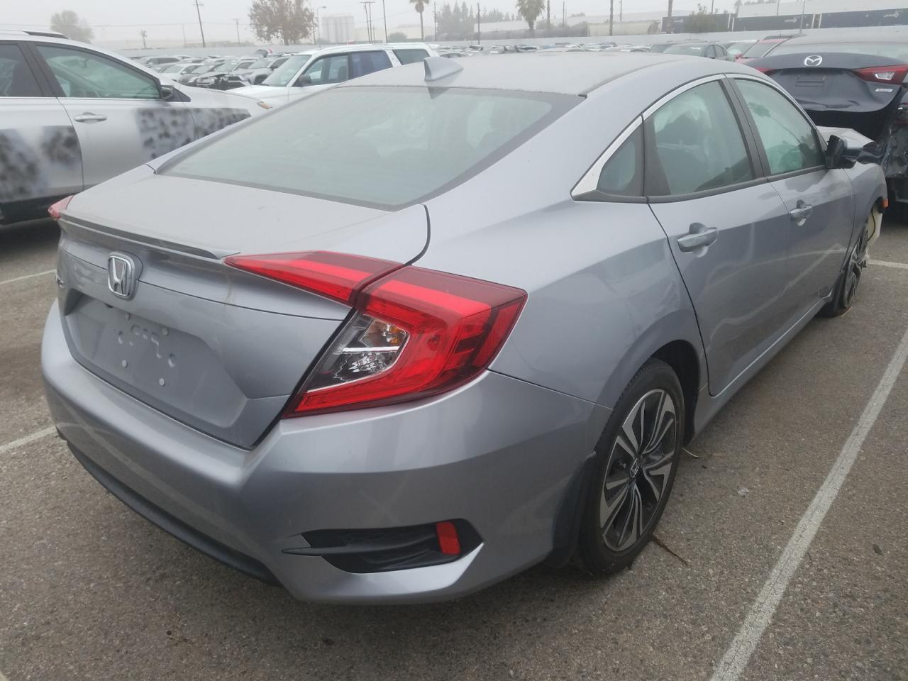 Photo 4 from auction – 2016 HONDA CIVIC EX with VIN 2HGFC1F38GH642174
