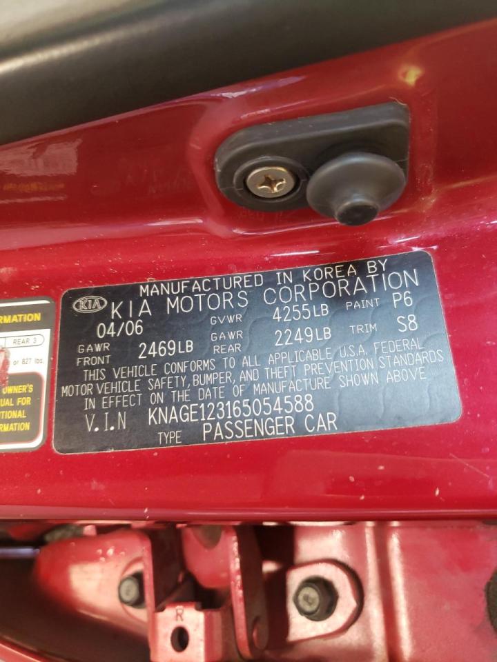 Photo 10 from auction – 2006 KIA OPTIMA LX with VIN KNAGE123165054588
