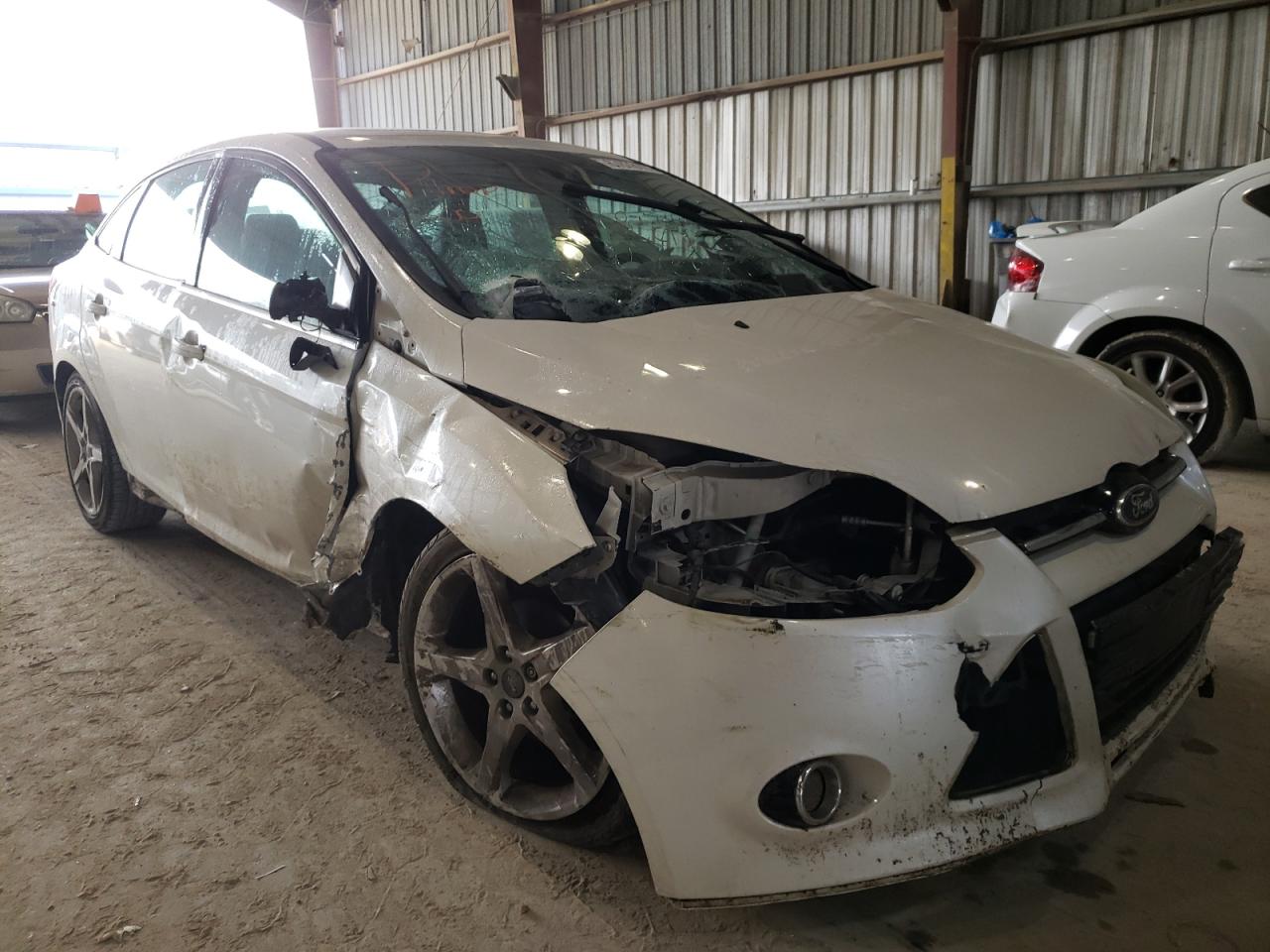 FORD FOCUS TITA 2012 with VIN 1FAHP3J25CL377397 - Photo from auction