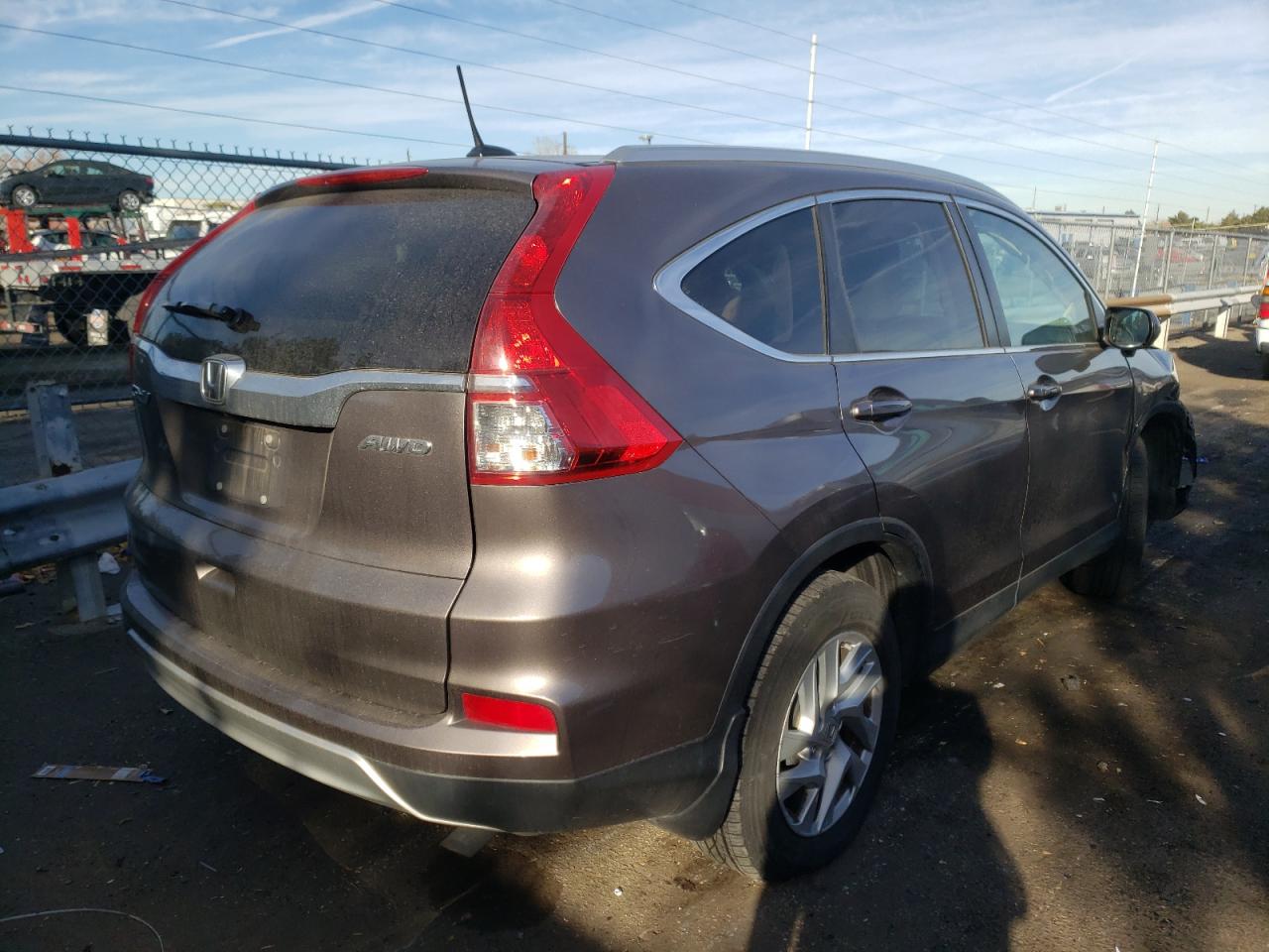 Photo 4 from auction – 2016 HONDA CR-V EXL with VIN 5J6RM4H73GL010089