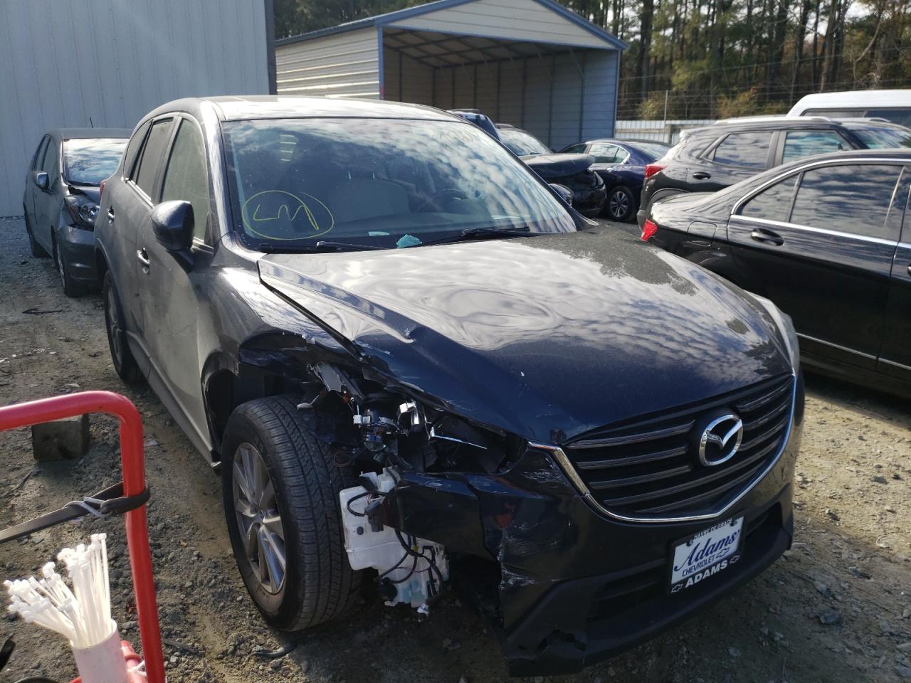 Photo 1 from auction – 2016 MAZDA CX-5 TOURI with VIN JM3KE4CY4G0849035