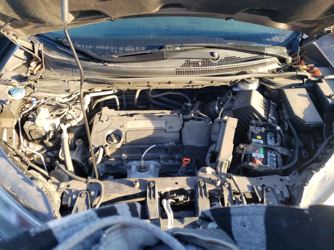 Photo 7 from auction – 2015 HONDA CR-V LX with VIN 5J6RM4H35FL072069